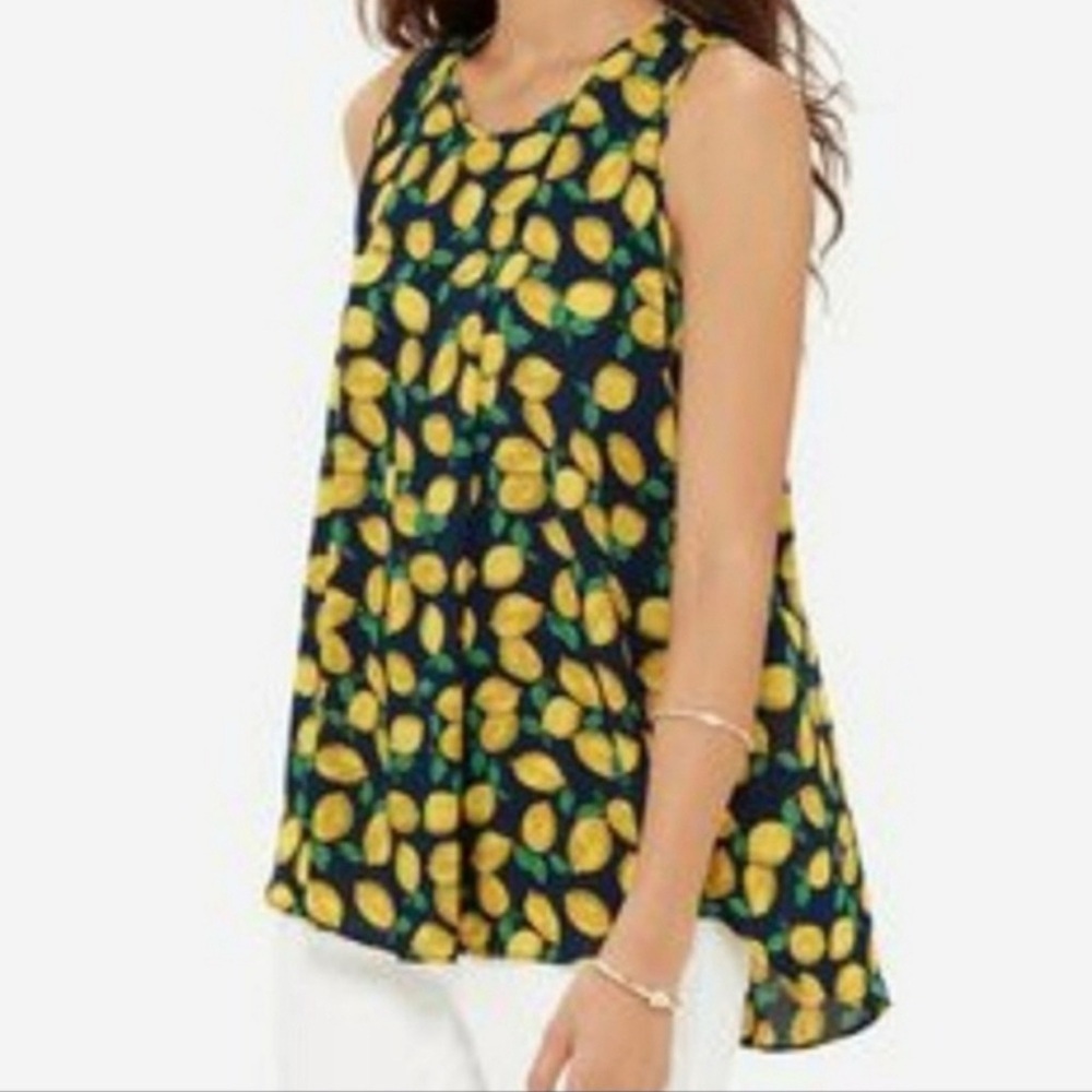 The limited lemon top. Sleeveless flowy. Size medium